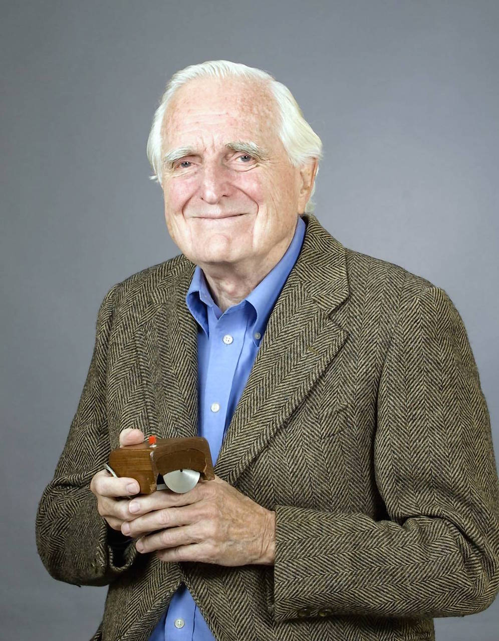 Doug Engelbart with the first mouse
